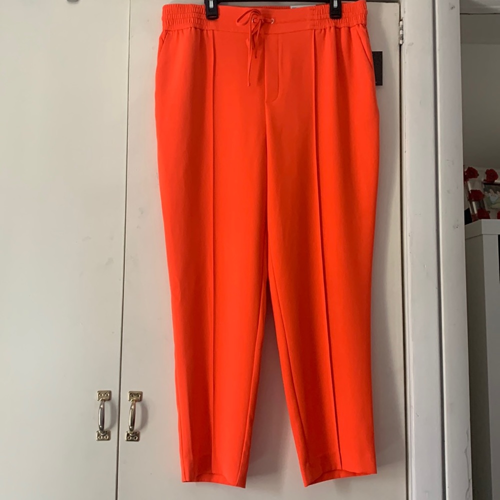 Vibrant orange cropped pull on pants. Great for summer!